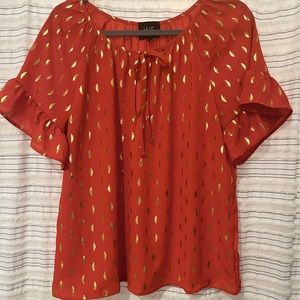 Orange and gold blouse